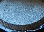 Una foto de tarta de pera y queso