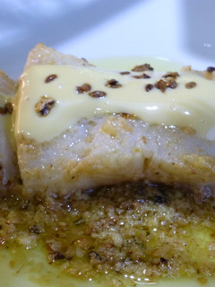 Una foto de Lenguado rebozado en almendras y salsa de limón