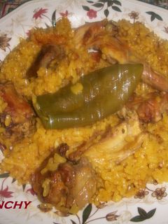 Una foto de Paella de conejo con pebrella