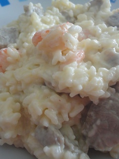 Una foto de Risotto de gambas y solomillo