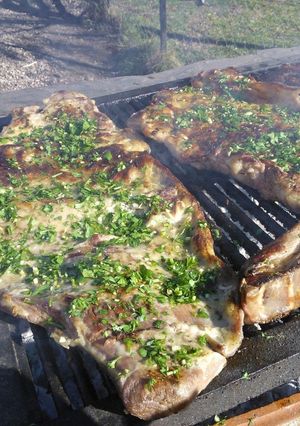 Una foto de Asado a la parrilla de matambre de vaca a la provenzal tiernísimo