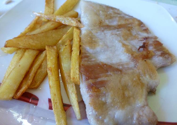 Presa ibérica con patatas fritas