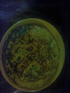 Una foto de Tortilla de zapallos y cebolla