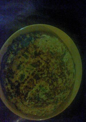 Una foto de Tortilla de zapallos y cebolla