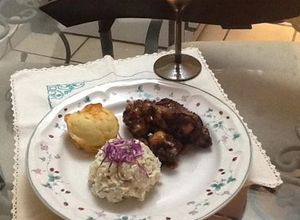 Una foto de Alitas y muslos agridulces