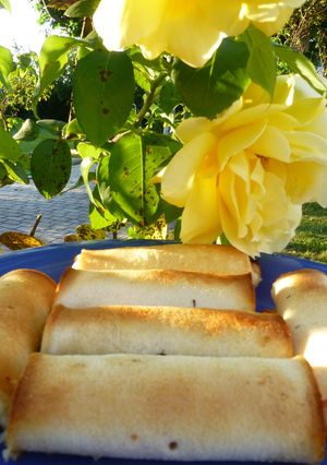 Una foto de Sandwich canelón de queso y jamón