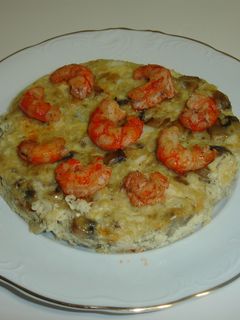Una foto de Budín de merluza y champiñones