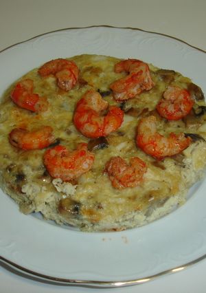Una foto de Budín de merluza y champiñones