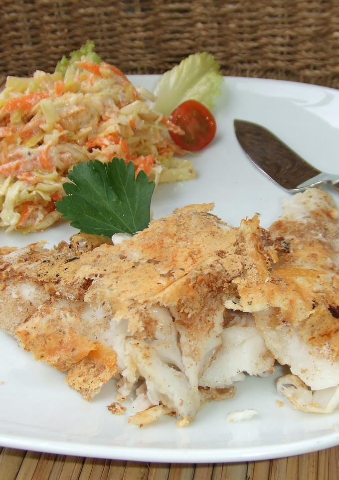Una foto de Merluza con costra de queso parmesano