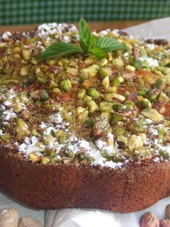 Una foto de Pastel especial de pistachos y naranja