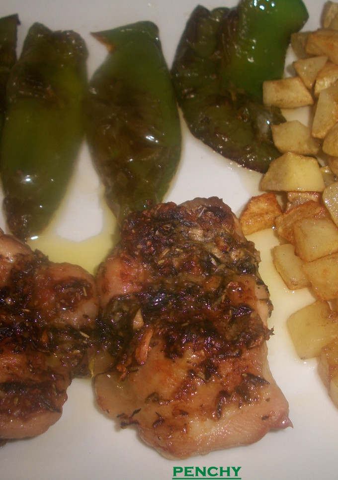 Una foto de Contramuslo de pollo con mantequilla a las hierbas