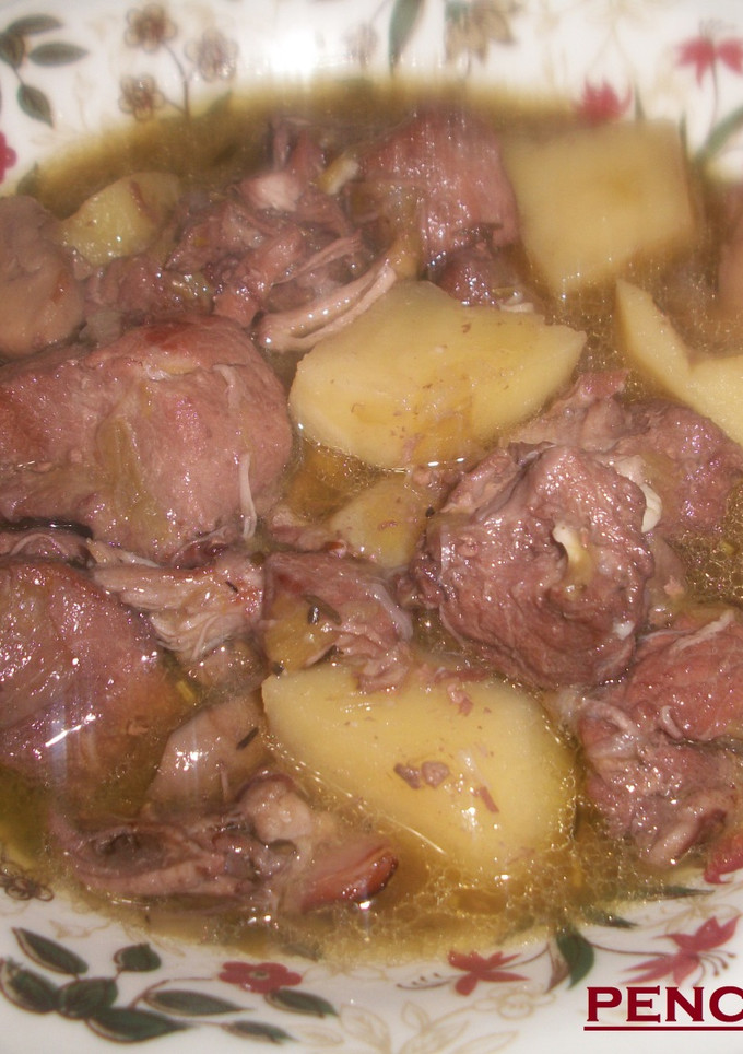 Una foto de Cerdo con champiñones al vino tinto