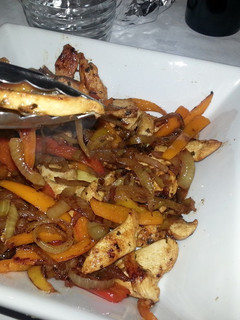 Una foto de Fajitas de pollo con pimientos