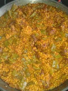 Una foto de Arroz con pato en paella