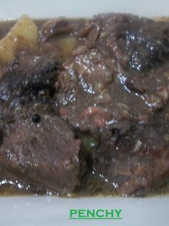 Una foto de Carrilleras en salsa de vino a las hierbas