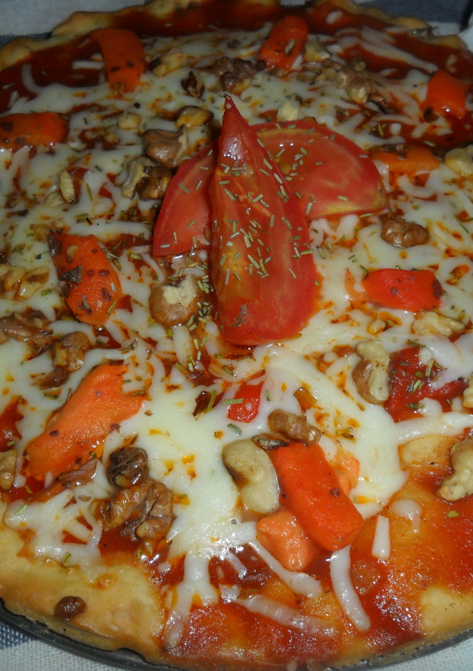 Una foto de Pizza con nueces