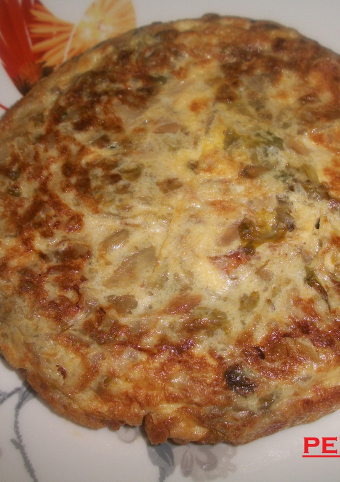 Una foto de Tortilla de lechuga con cebolleta tierna