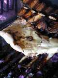 Asado a la parrilla de matambre de cerdo al roquefort
