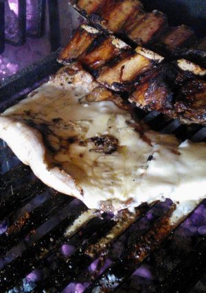 Una foto de Asado a la parrilla de matambre de cerdo al roquefort