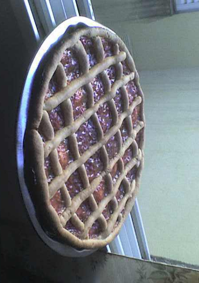 Una foto de Pasta frola de chocolate, dulce de leche y nueces