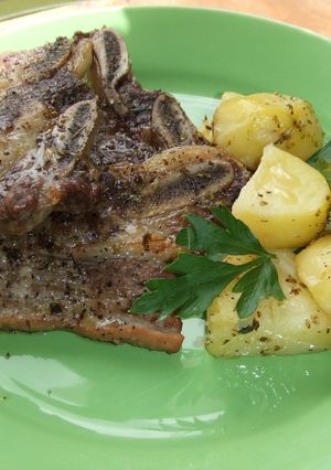 Una foto de Asado al horno con papas