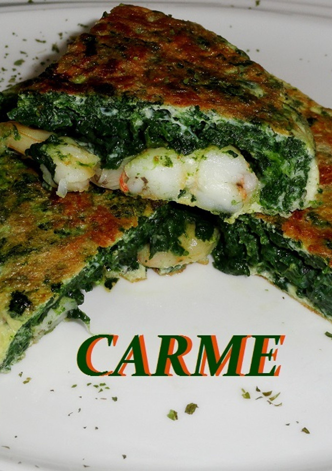 Una foto de Tortilla de espinacas y langostinos