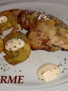 Una foto de Conejo asado con queso