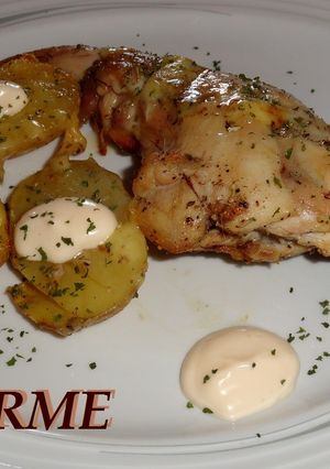 Una foto de Conejo asado con queso