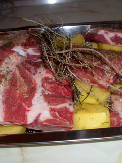 Una foto de Costilla de cerdo con patata al horno
