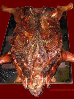 Una foto de Lechón a la parrilla