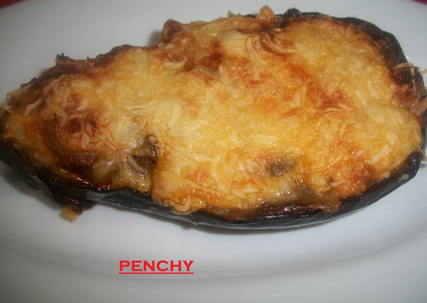 Berenjenas con queso cheddar y sobrasada a la miel