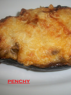 Una foto de Berenjenas con queso cheddar y sobrasada a la miel
