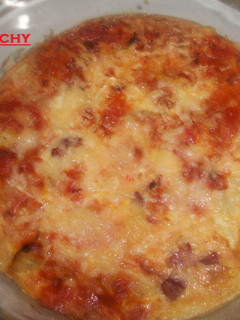 Una foto de Pastel de calabacines y jamón gratinado al parmesano