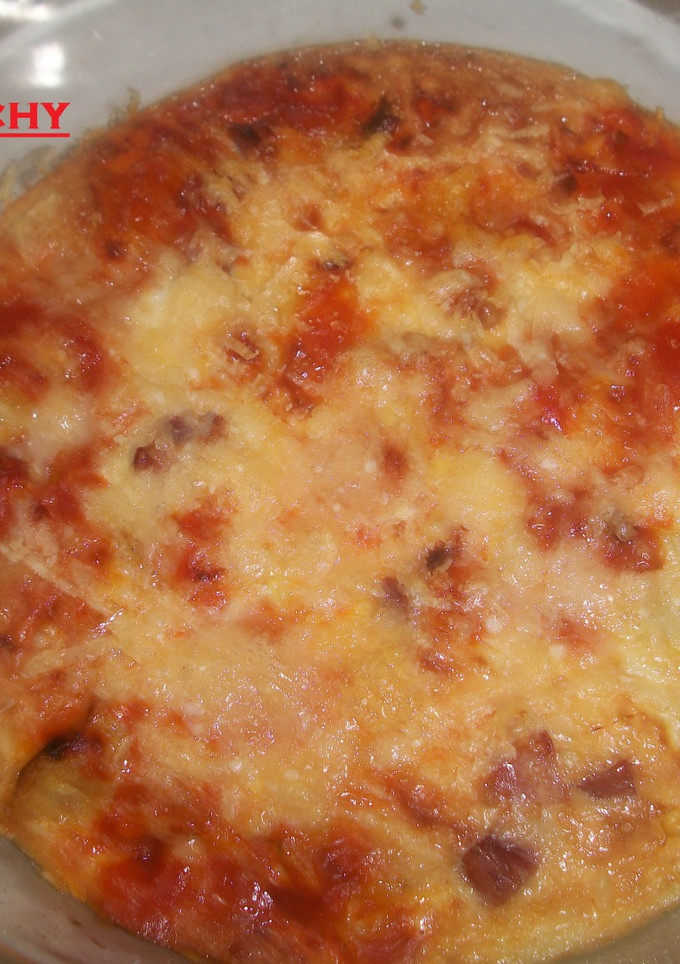 Una foto de Pastel de calabacines y jamón gratinado al parmesano