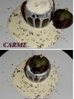 Una foto de Berenjenas rellenas de langostinos con salsa de queso