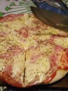 Una foto de Pizza con algas Nori