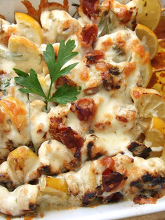 Una foto de Brochetas de pollo y jamón gratinadas con queso