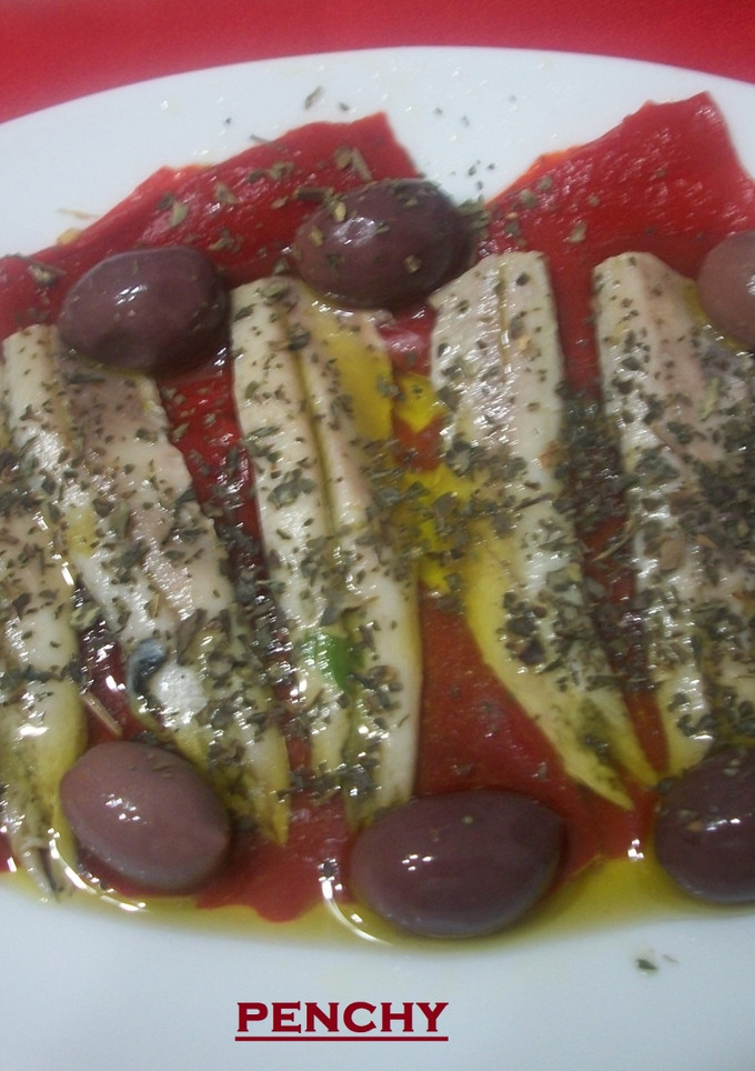 Una foto de Capitas de torero con boquerones anchoados a la albahaca