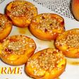 Melocotones al horno con almendras y miel