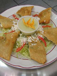 Una foto de Quesadillas de flor de calabaza (con queso y epazote)