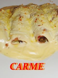 Una foto de Canelones de acelgas con salsa de queso