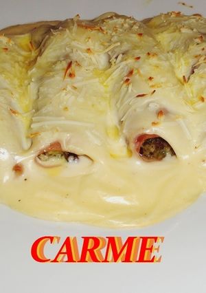 Una foto de Canelones de acelgas con salsa de queso
