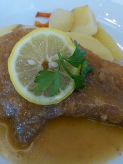 Una foto de Chuleta de cerdo con patatas
