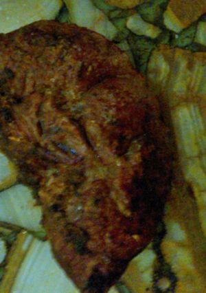 Una foto de Asado a la parrilla de tortuguita al ajillo