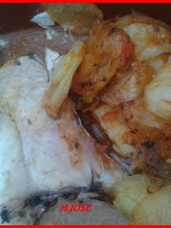 Una foto de Cogote de merluza al horno con panaderas