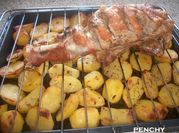 Una foto de pernil al horno