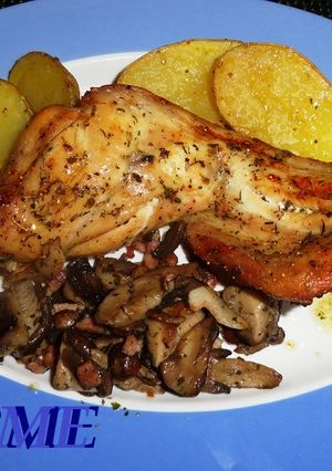 Una foto de Conejo macerado asado con patatas