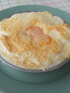 Una foto de Huevos nevados con setas al horno