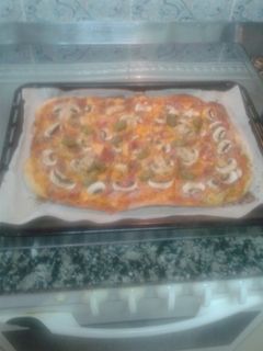 Una foto de Pizza de beicon casera