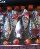 Sardinas al horno con tomates cereza y jamón ibérico al cava
